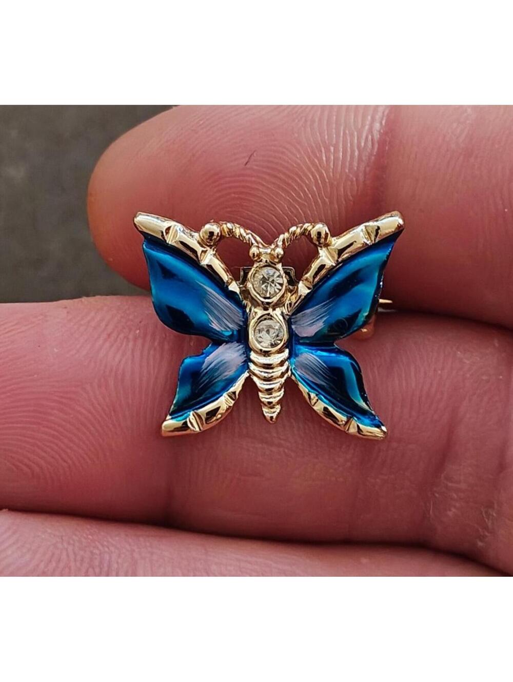 1980s Gold Tone Blue Enamel Butterfly Brooch Accented With Clear Rhinestones
